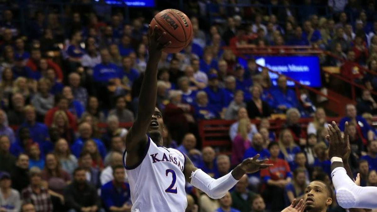 Lagerald Vick (left) is averaging 16 points per game so far this season for Kansas.