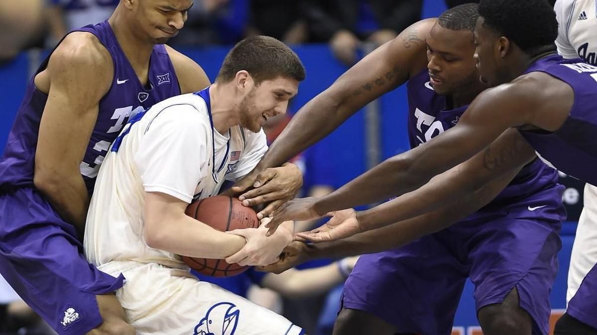 Kansas’ Svi Mykhailiuk, who wrestled a rebound away from a trio of TCU defenders during a game in January, could see more playing time.