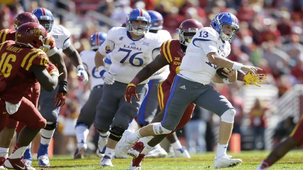
Kansas quarterback Ryan Willis rushed the ball during the second half of last Saturday’s game at Iowa State.

