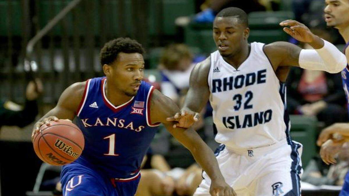 
Kansas guard Wayne Selden Jr. dribbled past Rhode Island guard Jared Terrell during their game last month.

