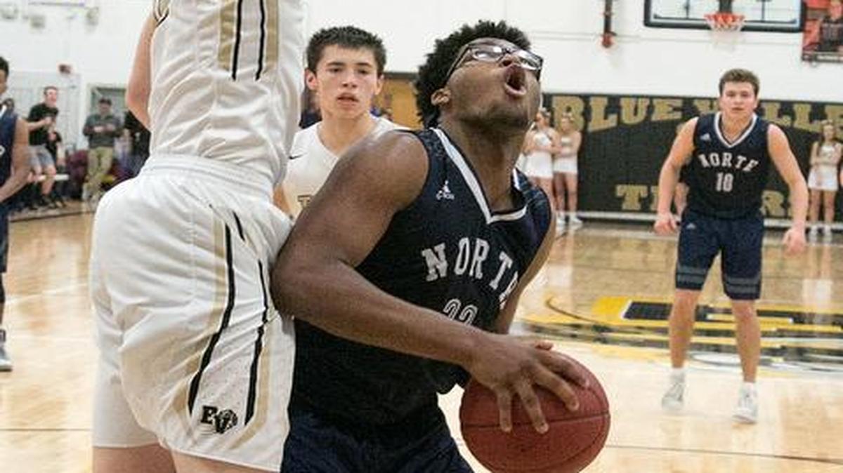 Miles Emery, who also played basketball at Blue Valley North, committed to play football at KU.