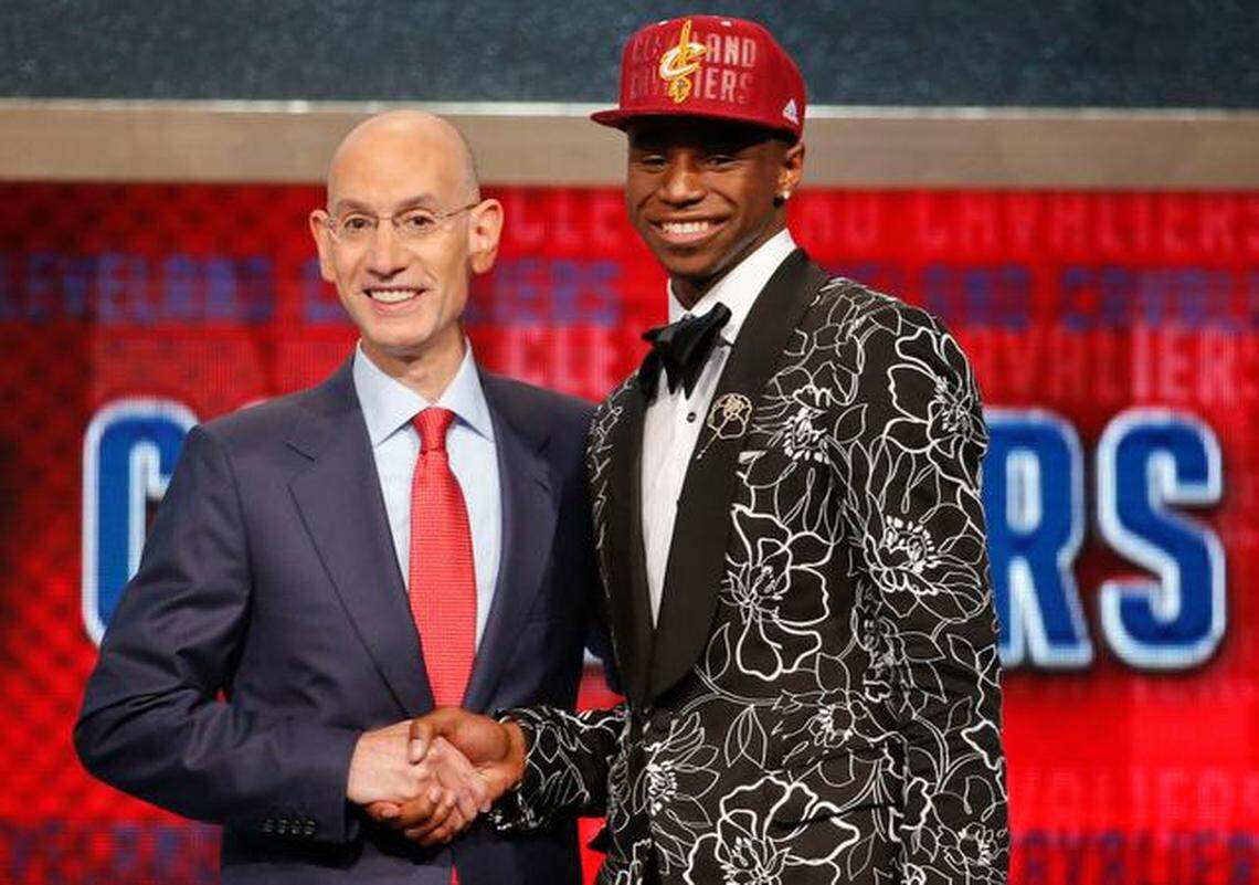 KU’s Andrew Wiggins shook hands with NBA commissioner Adam Silver after Wiggins was chosen Thursday by Cleveland as the No. 1 overall pick in the NBA Draft.