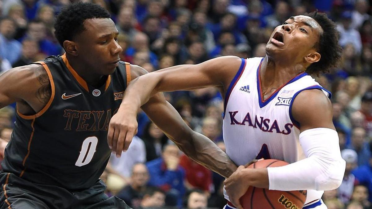 Texas’ Tevin Mack stripped the ball away from KU’s Devonte’ Graham during the first half of Saturday's game at Allen Fieldhouse.