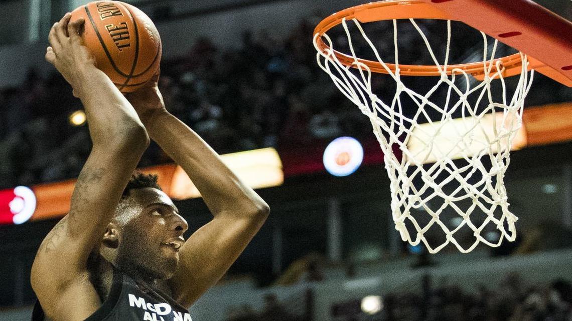Mitchell Robinson dunks during the second half of the McDonald’s All-American high school boys basketball game in Chicago.