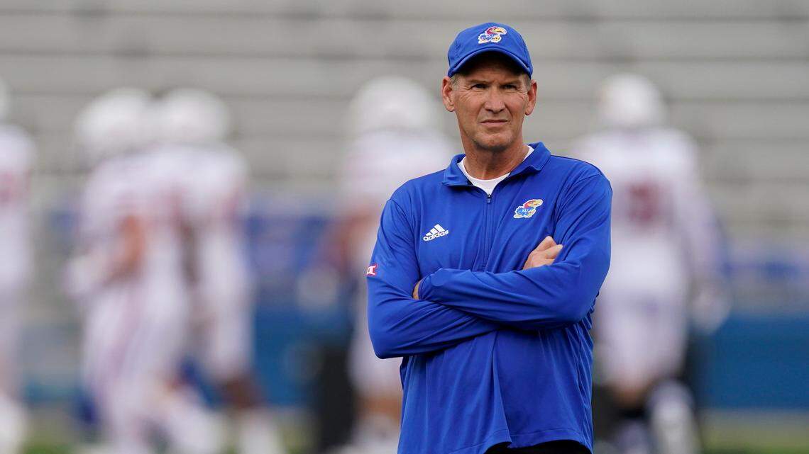 Kansas head football coach Lance Leipold watches warmups before a game against South Dakota on Friday, Sept. 3, 2021, in Lawrence, Kan.