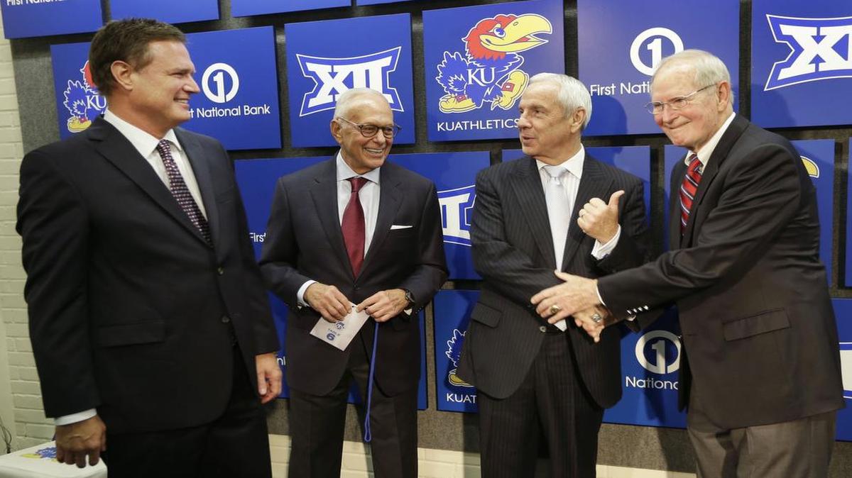 Kansas basketball coach Bill Self, from left, talks with former KU coaches Larry Brown, Roy Williams and Ted Owens following a news conference for the 60th anniversary of Allen Fieldhouse in Lawrence on Oct. 27, 2014.