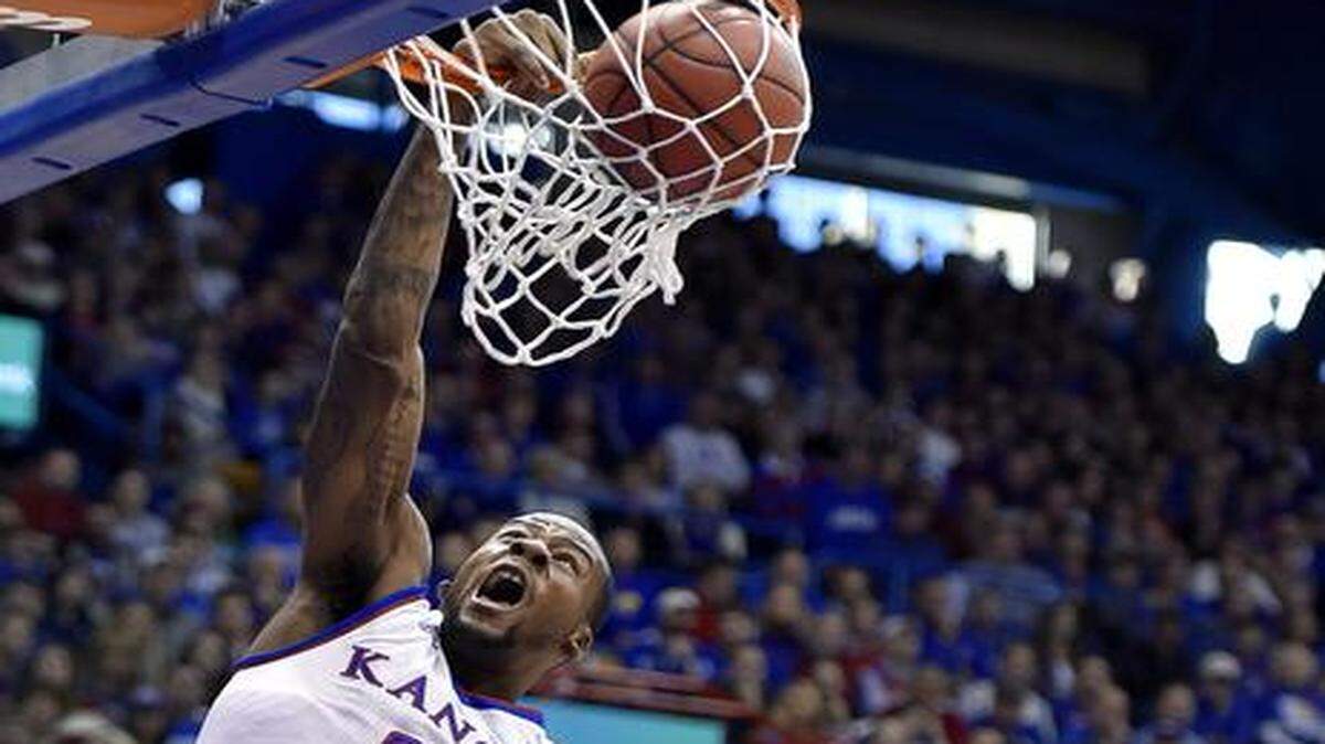 
KU’s Cliff Alexander got loose for a dunk over UNLV’s Goodluck Okonoboh (11) during the first half of Sunday’s game at Allen Fieldhouse.
