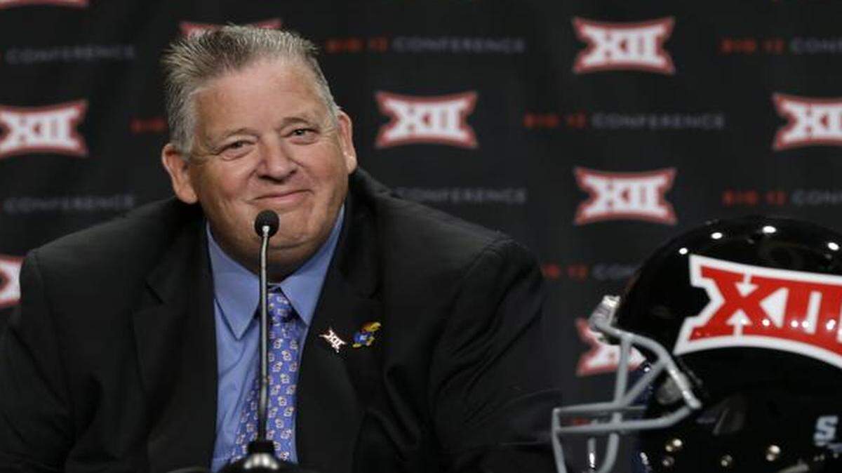 
Kansas head coach Charlie Weis smiled during Big 12 Media Days in Dallas in July.
