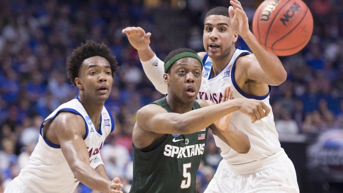 Kansas and Devonté Graham (4) beat Michigan State and Cassius Winston (5) in the 2017 NCAA Tournament second round in Tulsa.