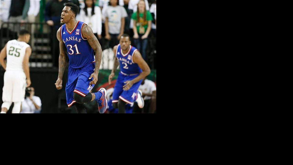 
Kansas's Jamari Traylor (31) celebrates a score against Baylor in the second half of an NCAA college basketball game, Wednesday, Jan. 7, 2015, in Waco, Texas. Traylor lead the team in scoring with 13-points in the 56-55 Kansas win. 
