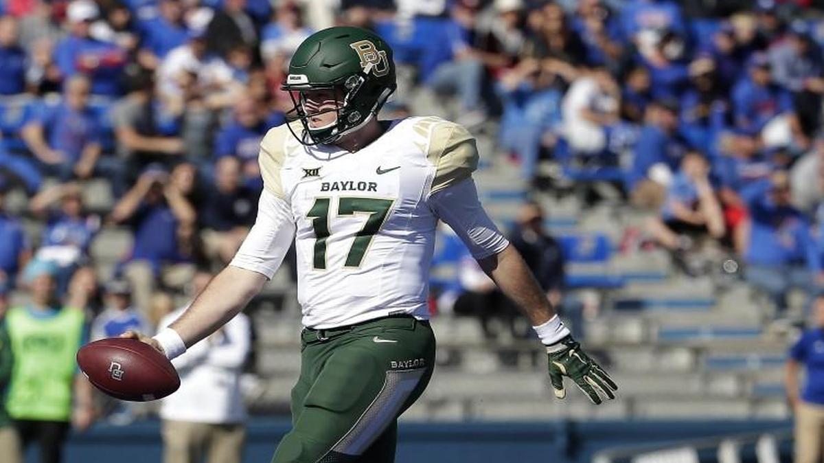 
Baylor quarterback Seth Russell ran into the end zone and scored a touchdown during the first half of Saturday’s game at Kansas.
