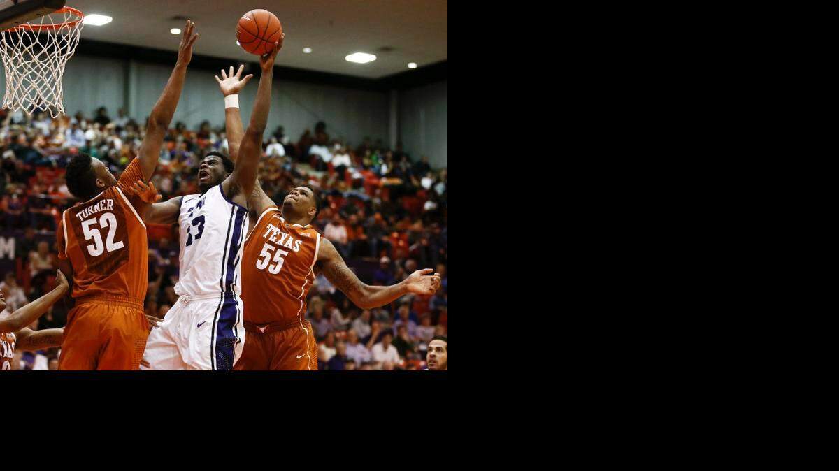 
When KU faces Chris Washburn (center) and TCU on Wednesday, it will be in a venue that’s smaller than the Jayhawks are used to. The game will be played at Wilkerson-Greines Activity Center, a district high school gym in Fort Worth that seats 4,750. TCU is renovating its home gym, Daniel-Meyer Coliseum, and playing off campus this season.


