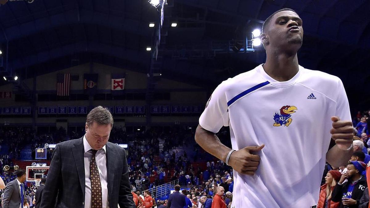 Kansas coach Bill Self (left) leaves the court after Tuesday’s loss to Texas Tech with freshman Billy Preston, who has yet to see the floor in a regular-season game.
