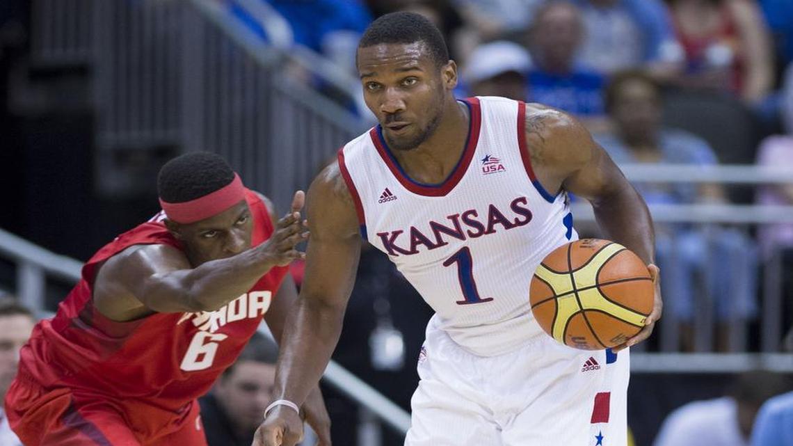 
Team Canada forward Mamadou Gueye (left) fouled University of Kansas guard Wayne Selden, who had gotten a turnover during the Kansas and Team Canada basketball game at the Sprint Center on June 26.
