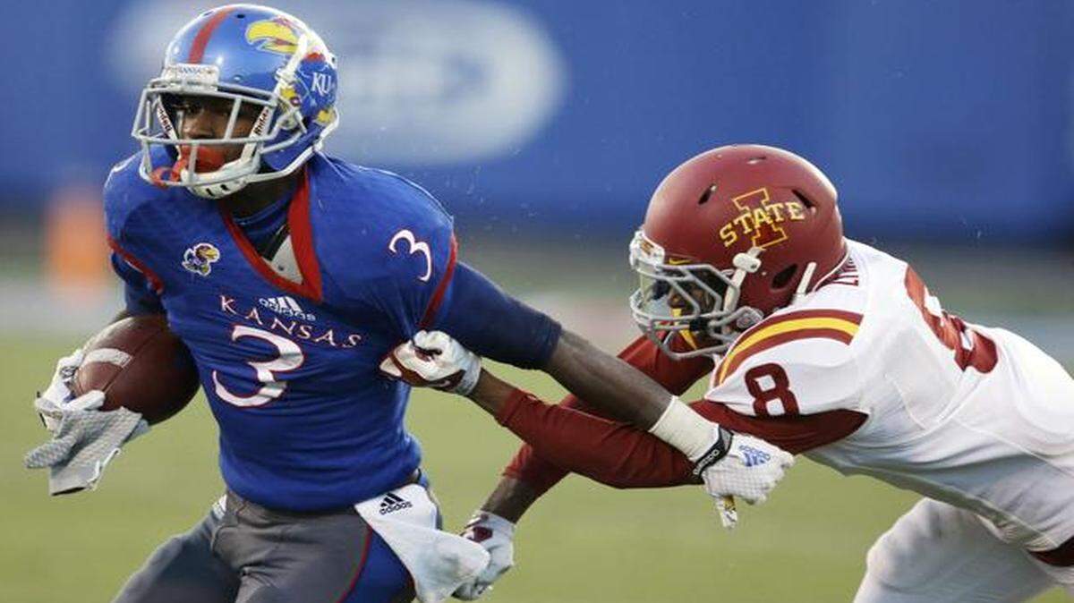 
Kansas wide receiver Tony Pierson broke away from Iowa State defensive back Kenneth Lynn during the second half of Saturday’s game.
