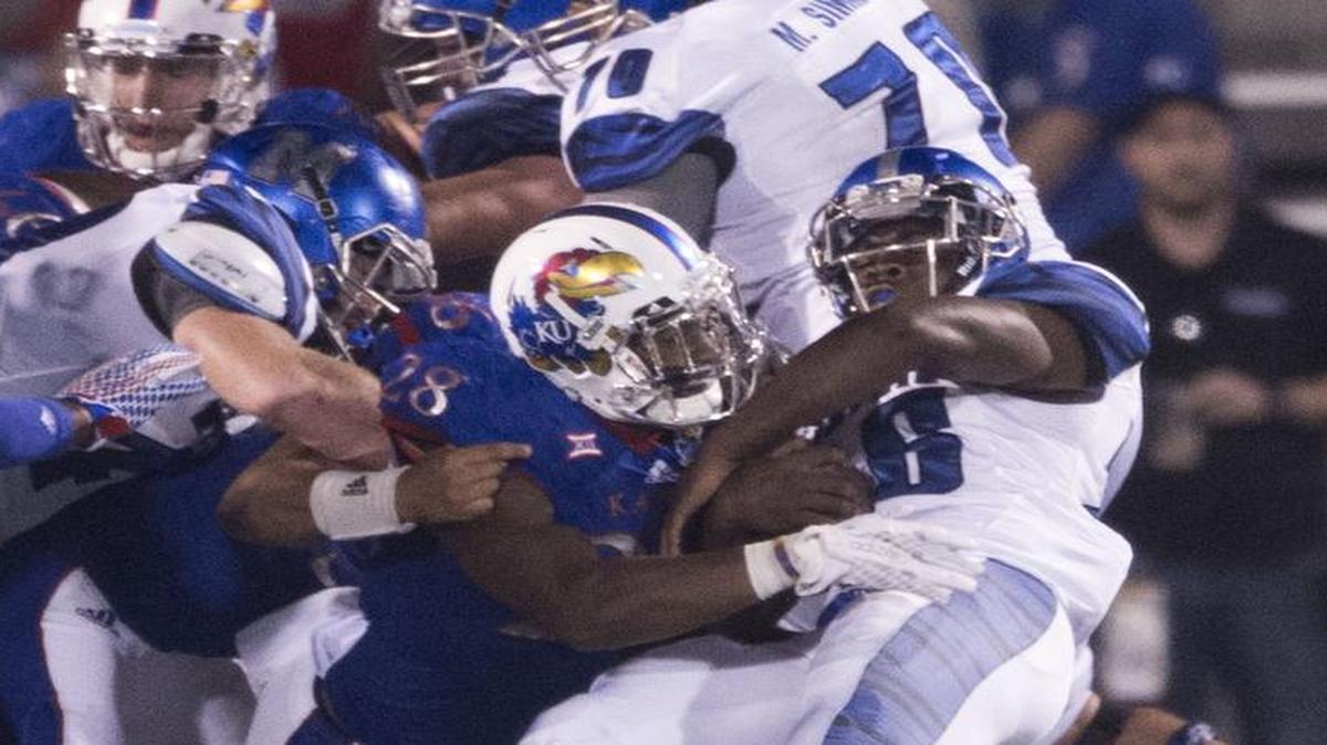 
Kansas linebacker Courtney Arnick made a tackle in Memphis’ 55-23 victory on Sept. 12.
