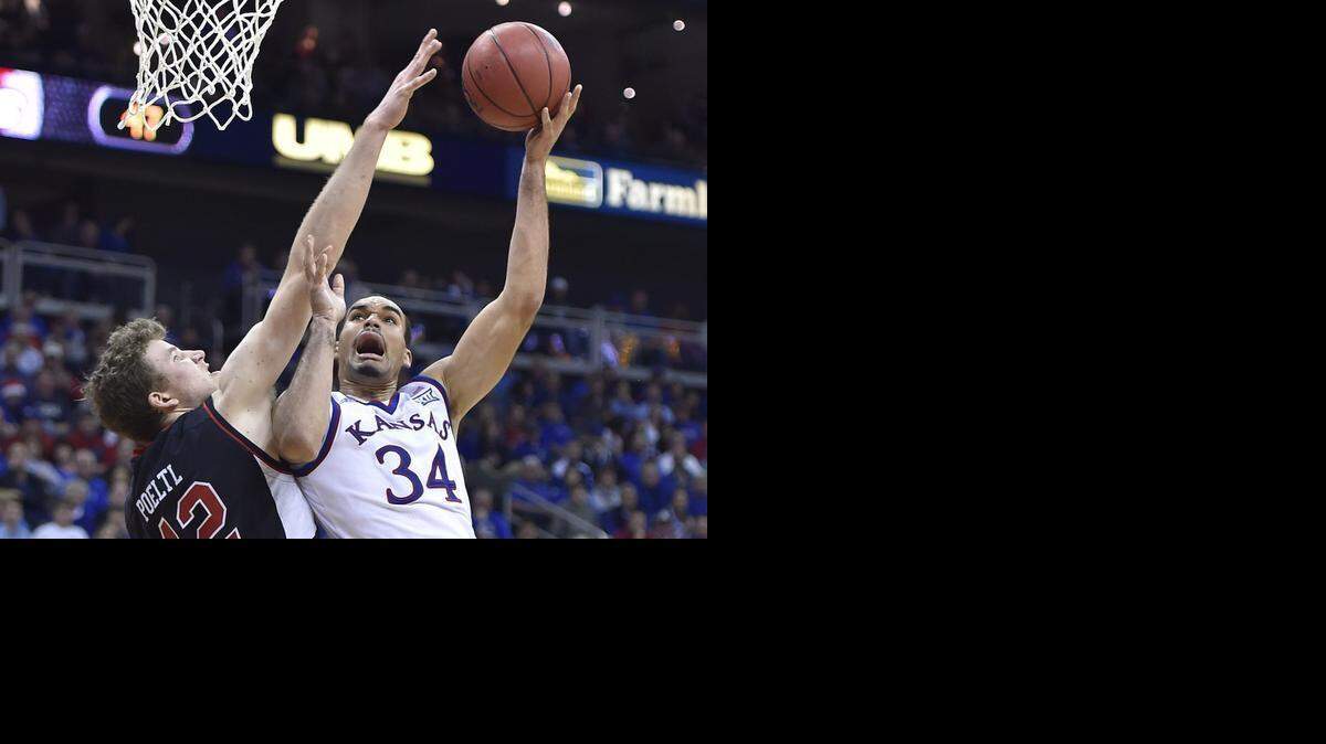 
KU forward Perry Ellis (right) is feeling better every day and has nearly recovered from a sprained right knee.
