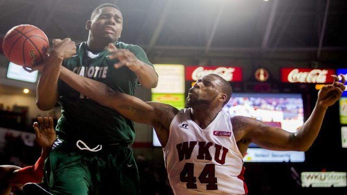 
Charlotte 49ers center Mike Thorne Jr. (left) battled for a rebound with Western Kentucky’s George Fant during a game in January.
