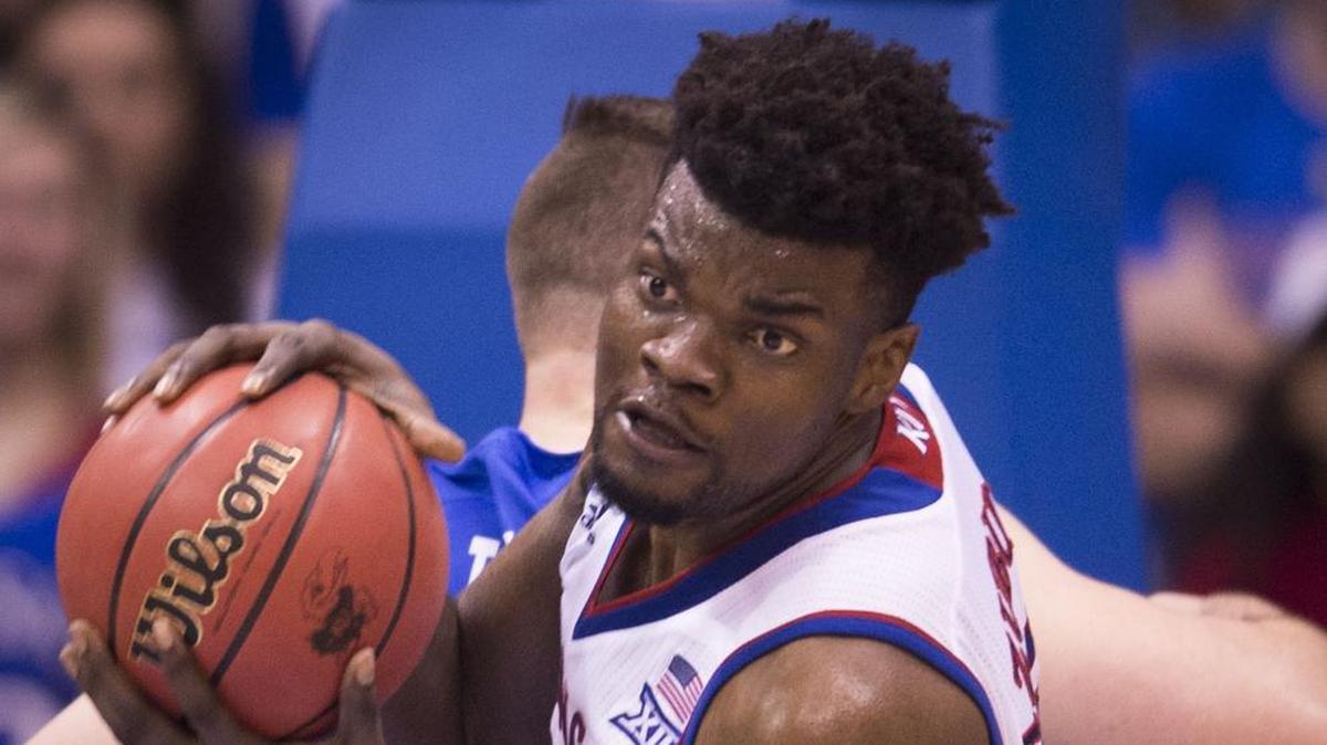 KU center Udoka Azubuike is receiving instruction from coach Bill Self in an attempt to improve his free-throw performance.