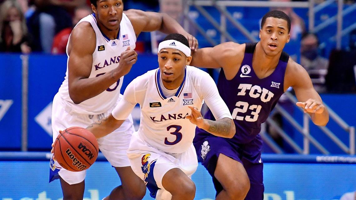 KU’s Dajuan Harris gets the fastbreak going during the second half of Thursday night’s Big 12 Conference game at Allen Fieldhouse. KU beat TCU, 59-51.