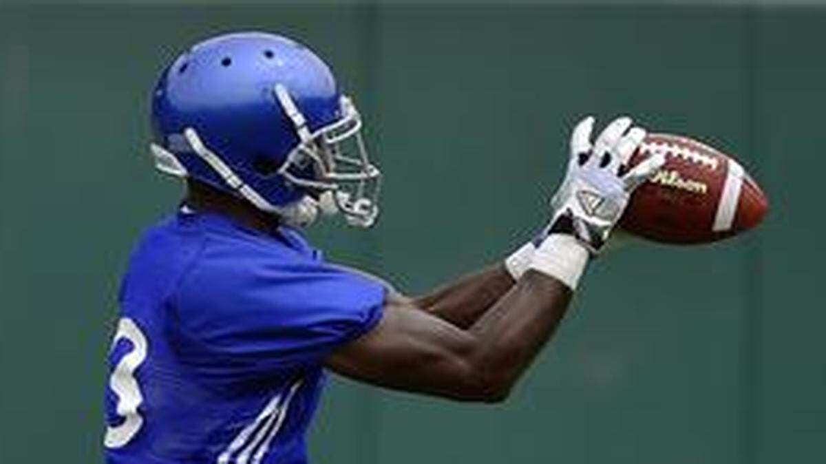 
Receiver Tony Pierson (right) is back on the field for the Jayhawks after dealing with a concussion last season.


