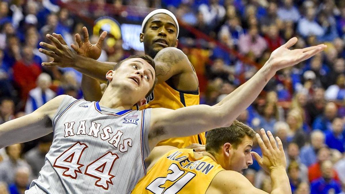 KU’s Mitch Lightfoot (left) is a former Arizona Gatorade Player of the Year. The Jayhawks play Arizona State on Sunday.