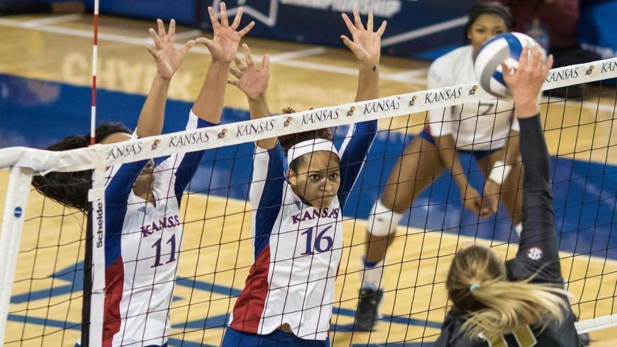Ainise Havili (left) and Janae Hall went up for a block against Missouri’s Regan Peltier on Dec. 4 in the NCAA Division I volleyball tournament.