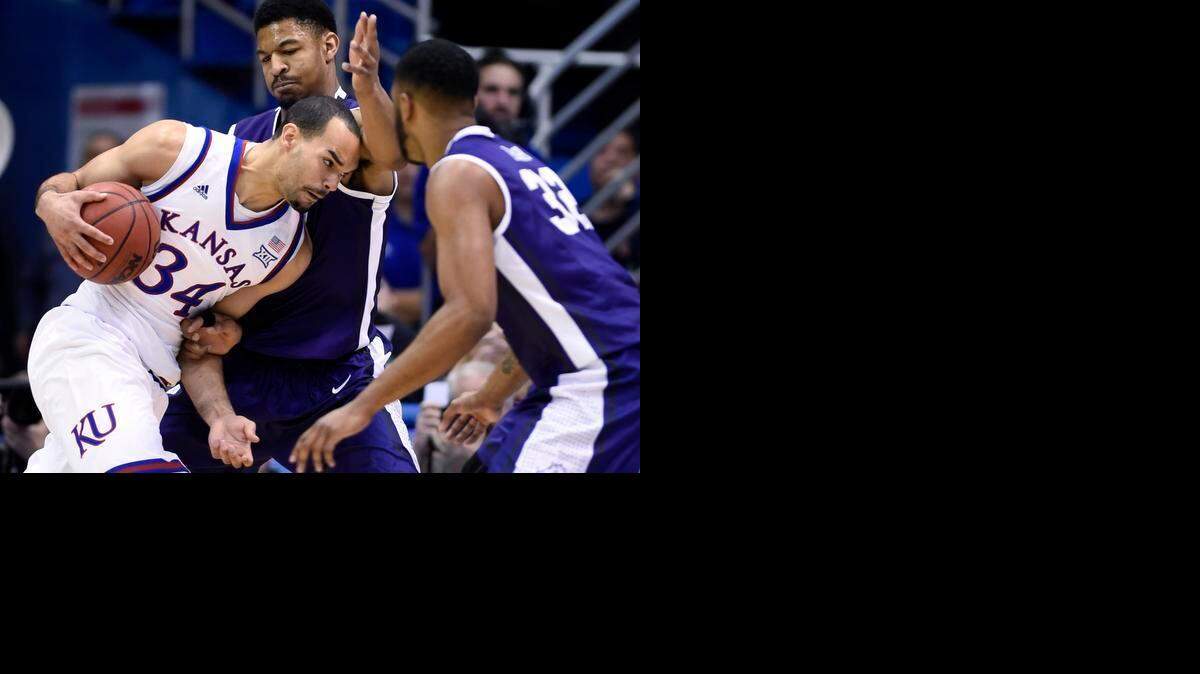 
KU's Perry Ellis (34) scored a game-high 23 points on 9-10 shooting from the field during the Jayhawks 81-72 win over TCU Saturday at Allen Fieldhouse. Ellis put his head down and down hard to the basket on TCU's Karviar Shepherd during the first half.
