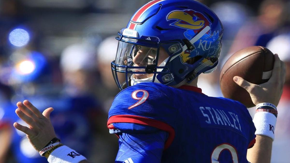 Kansas quarterback Carter Stanley threw a pass during the first half of Saturday’s game against Iowa State in Lawrence.