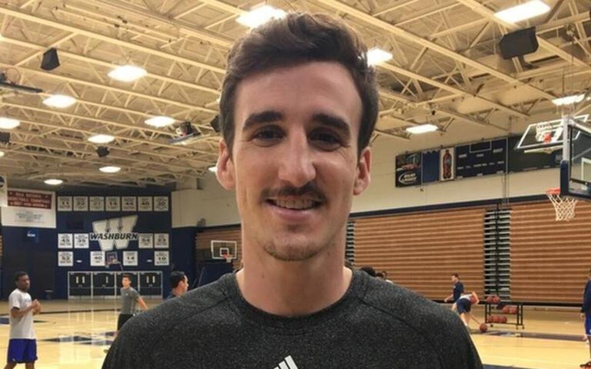 KU’s Jack Whitman, a graduate transfer from William & Mary, gave instruction to campers at Washburn’s basketball camp.