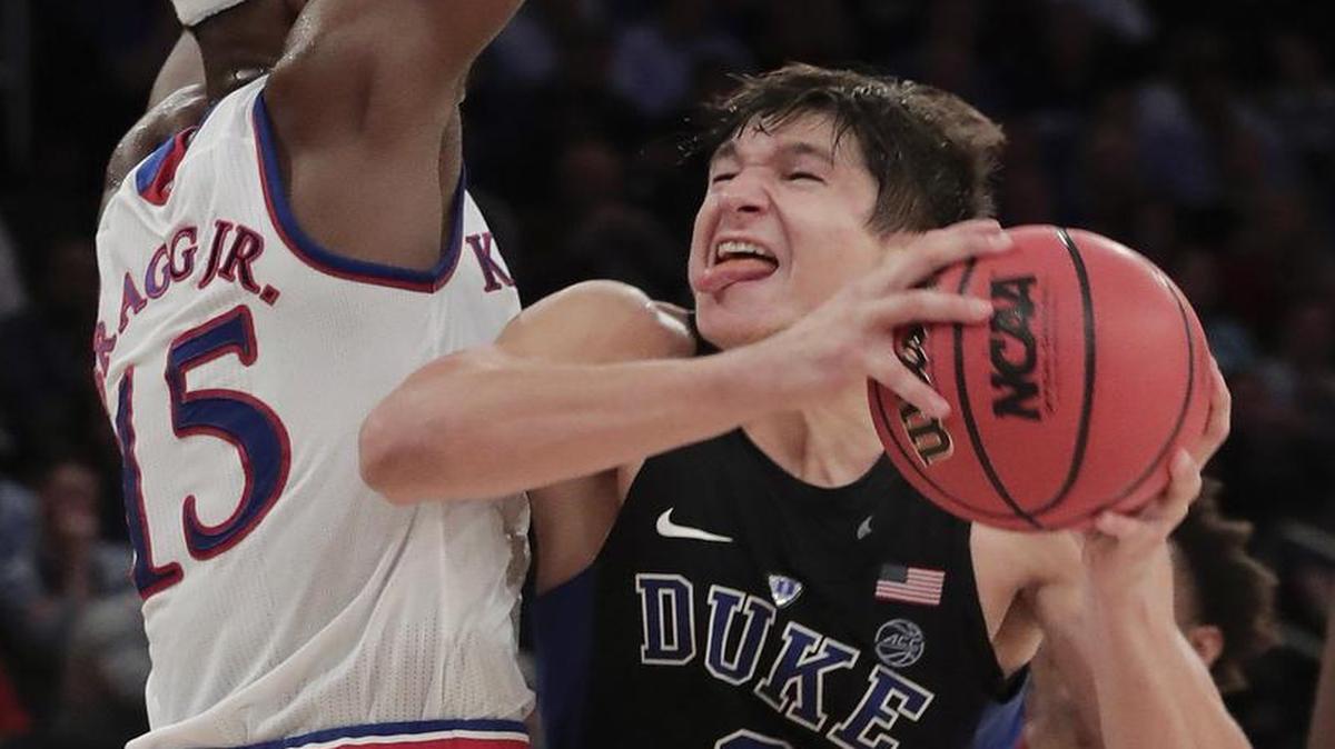 Duke guard Grayson Allen had trouble getting to the basket against KU’s Carlton Bragg.