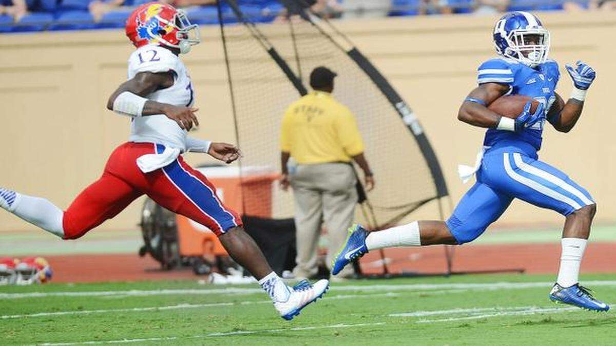 
Duke’s Shaun Wilson ran over the Jayhawks’ defense last week, including Darious Crawley.
