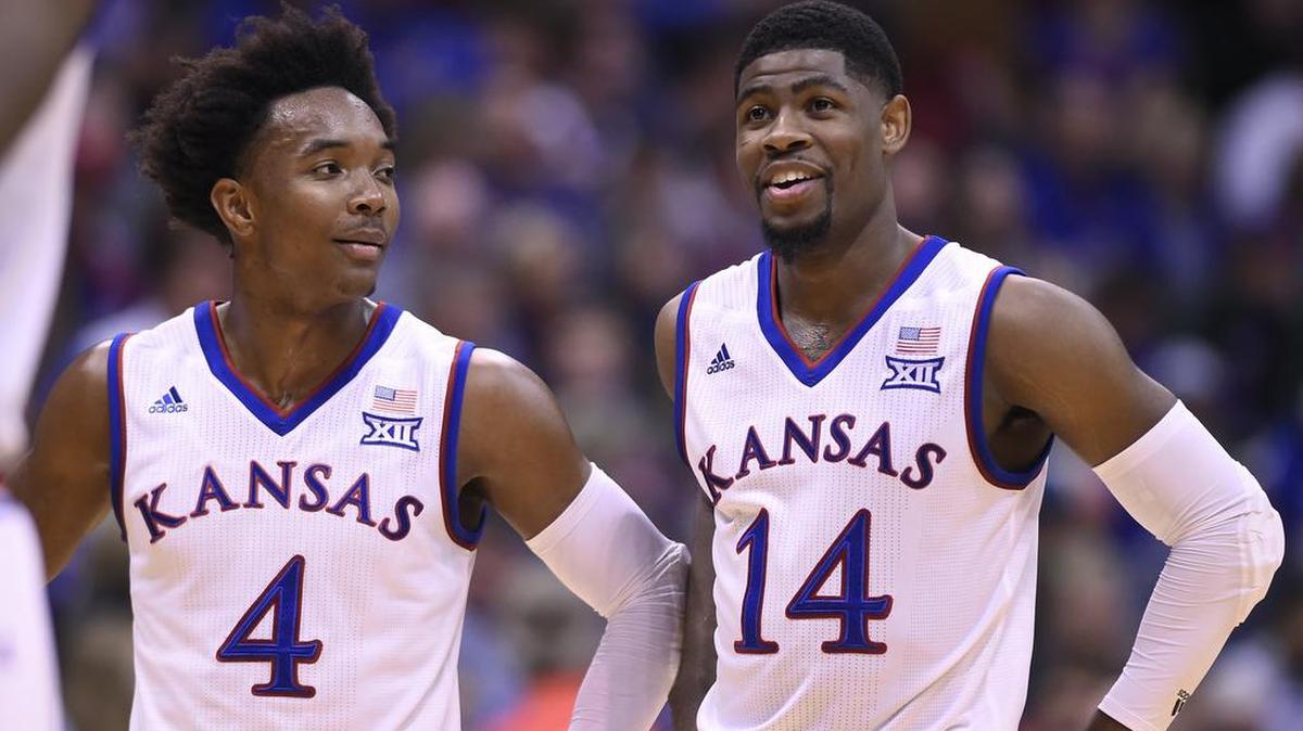 KU teammates Devonte Graham (4) and Malik Newman took a break while the Jayhawks were at the free throw line during the first half of an exhibition game last week at Allen Fieldhouse. KU beat Ptit State 100-54.