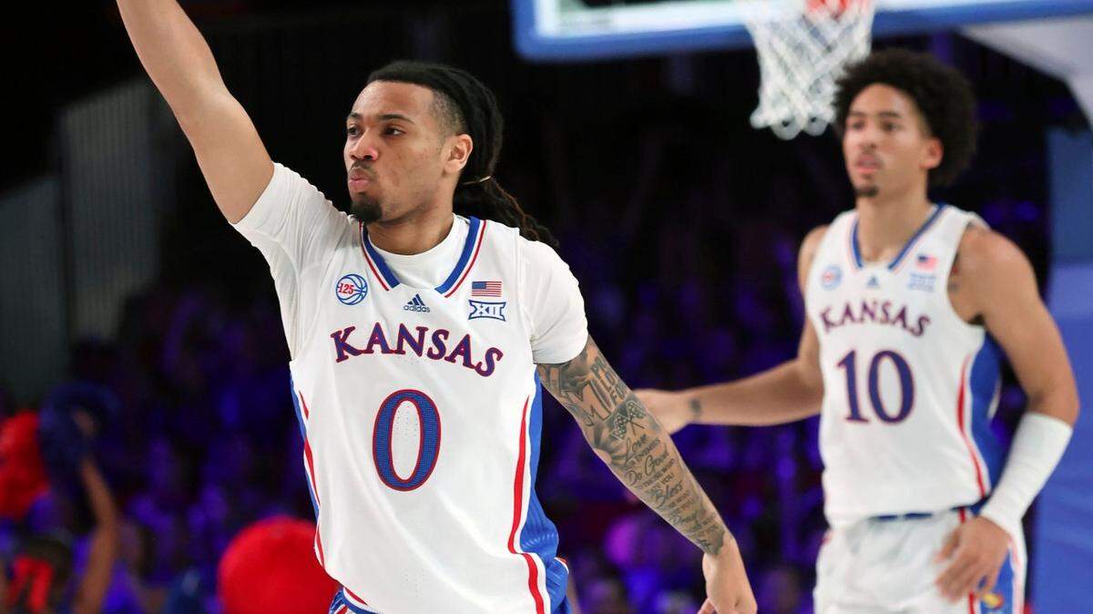 This photo provided by Bahamas Visual Services shows Kansas guard Bobby Pettiford Jr. and forward Jalen Wilson at the Battle 4 Atlantis at Paradise Island, Bahamas. Kansas defeated Wisconsin on a put-back from Pettiford after outlasting North Carolina State the game before.