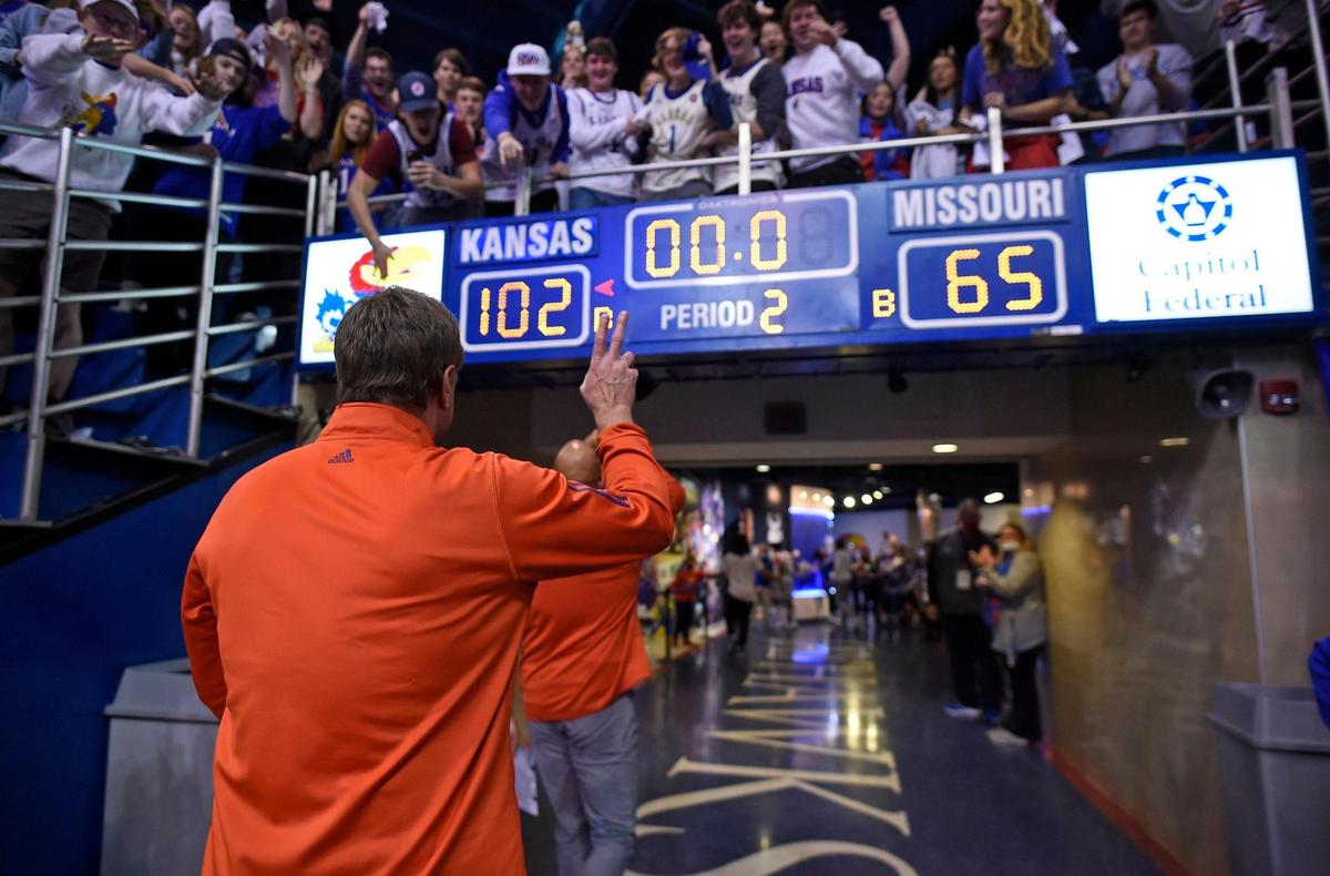 Kansas coach Bill Self salutes a happy student section after his Jayhawks dominated Missouri in last weekend’s Border War hoops game at Allen Fieldhouse.
