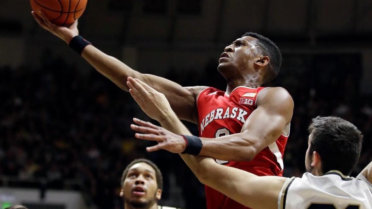 Former Jayhawk Andrew White (center) and Nebraska are likely to begin a series against Kansas next season.