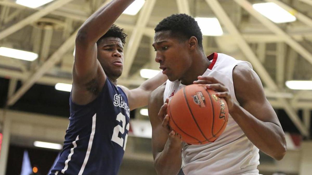Oak Hill Academy’s David McCormack (right) is one of three Kansas basketball signees selected to play in the McDonald’s All-America boys basketball game March 28 in Atlanta.