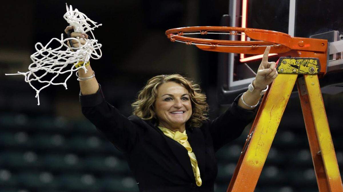 
Wichita State coach Jody Adams celebrated after the team’s victory over Drake in the championship game of the Missouri Valley Conference women’s tournament in 2014.
