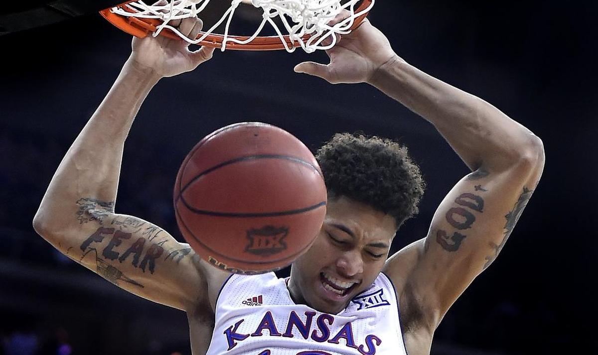 KU’s Kelly Oubre put an exclamation point on his game-high 25 points with this two-handed throwdown late in the Jayhawks’ 64-59 win over TCU on March 12, 2015 at the Big 12 Tournament at the Sprint Center.