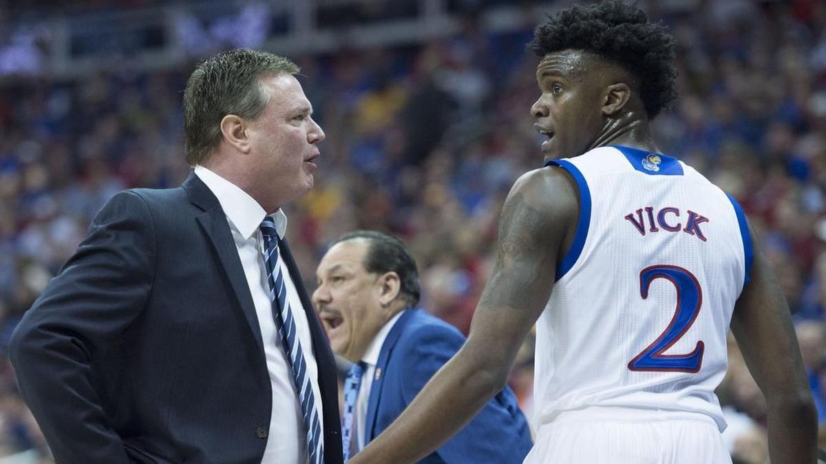 Kansas basketball coach Bill Self (left) said Monday he’s pulling guard Lagerald Vick out of the starting lineup.