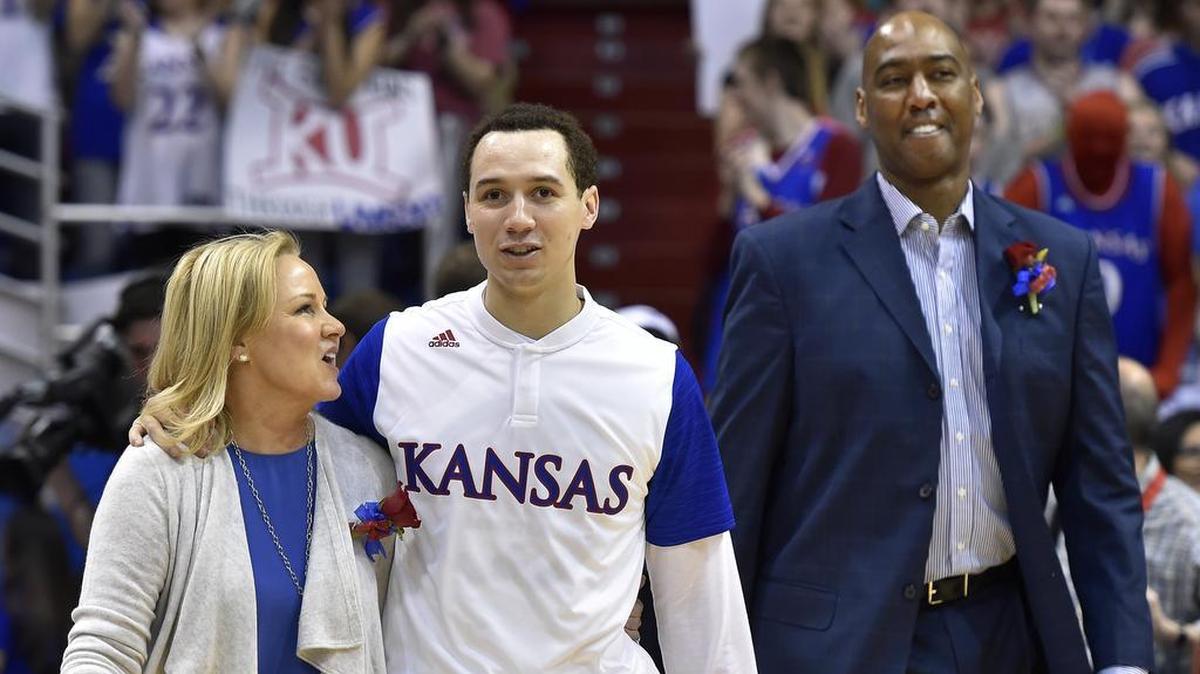 Evan Manning was joined by his parents for his senior day ceremony at KU’s Allen Fieldhouse in 2016.