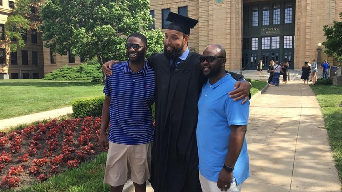 Former KU players Nick Bradford (left) and Terry Nooner (right) posed with former Jayhawk Drew Gooden in May of 2017 as Gooden graduated from KU.