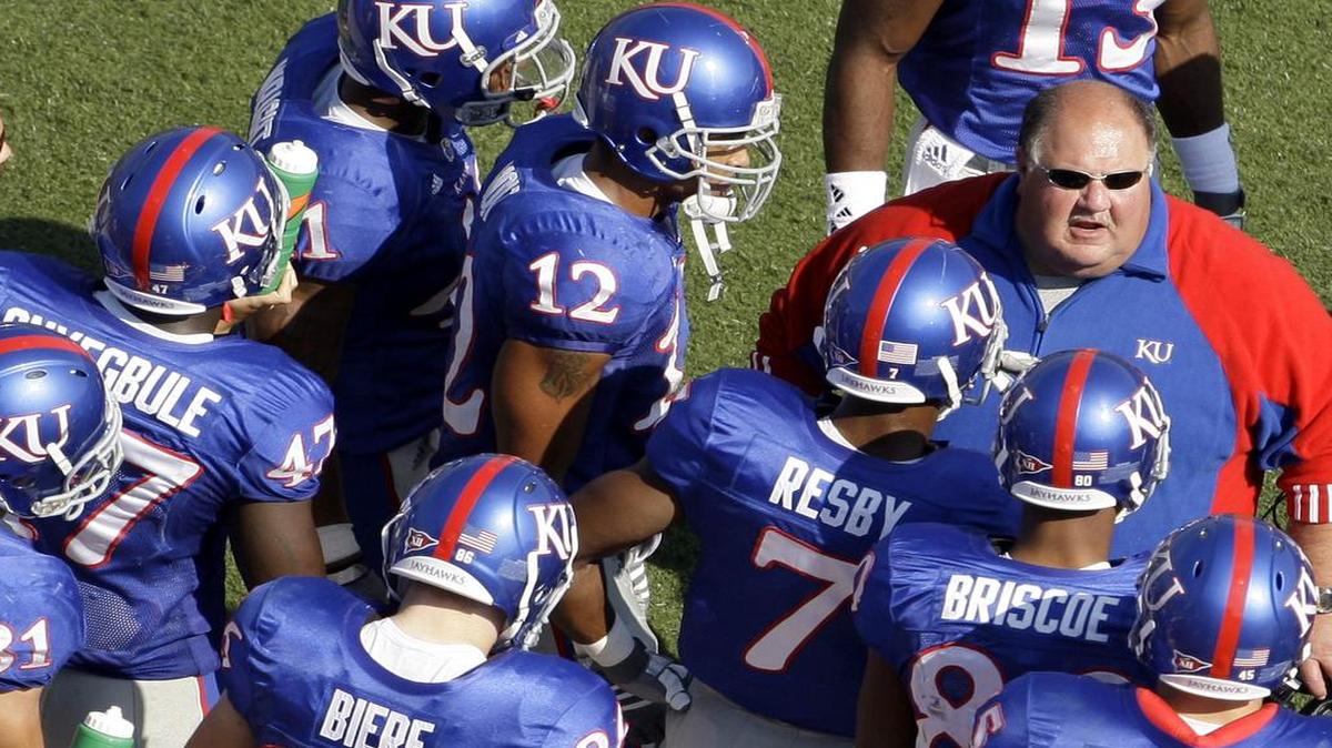 
Former Kansas coach Mark Mangino (right) added current KU coach David Beaty to the Jayhawks’ staff in 2008.

