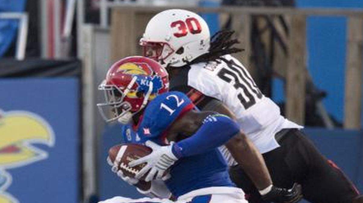 
Kansas Jayhawks cornerback Dexter McDonald intercepted a pass intended for Southeast Missouri State Redhawks fullback Ron Coleman in the second quarter Saturday.
