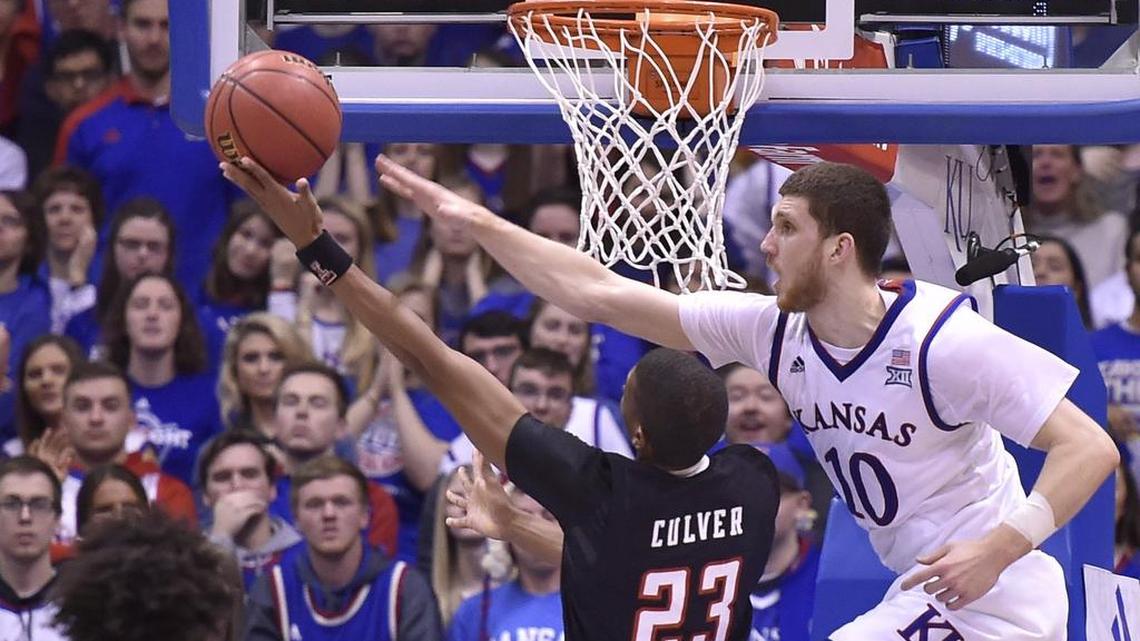 With KU’s smaller lineup, Svi Mykhailiuk (right) has had to focus more on rebounding — which coach Bill Self admits is not why he recruited Mykhailiuk.