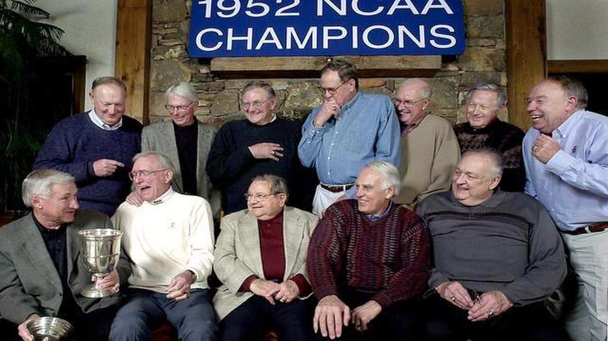 
Dean Smith may have become the most famous and most recognized member of the Kansas basketball team that won the 1952 NCAA title, but he got plenty of ribbing about riding the bench from his former teammates. While settling in for a 50th reunion picture at the Lawrence home of Bill Hougland, they joked about the old days and passed around the championship trophy that may have looked like sterling silver, but weighed but a few ounces — and had a removable top. 
