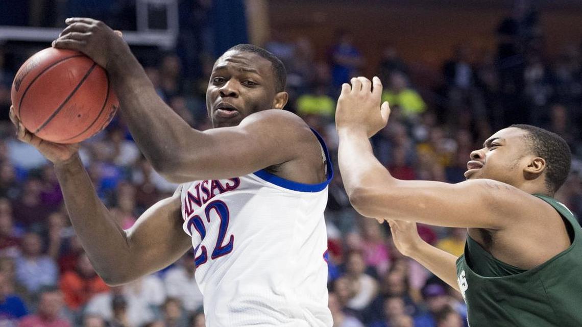 Kansas forward Dwight Coleby grabbed a rebound in front of Michigan State’s Nick Ward in an NCAA Tournament game March 19 in Tulsa, Okla.