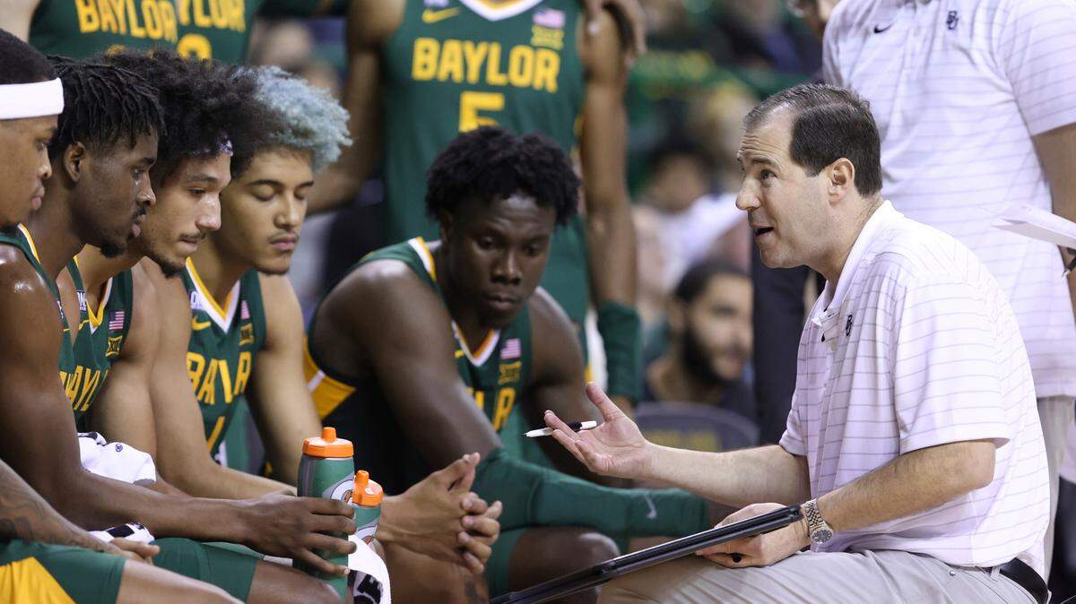 Baylor head coach Scott Drew (right) talks with his team during a timeout in the second half of a game against Alcorn State, Monday, Dec. 20, 2021, in Waco, Texas.
