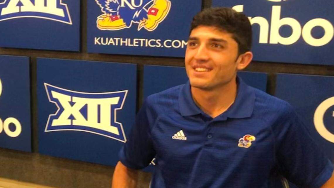 US Olympian and forner Kansas runner Bryce Hoppel talks to a reporter during a media day on June 30, 2021, at Allen Fieldhouse.