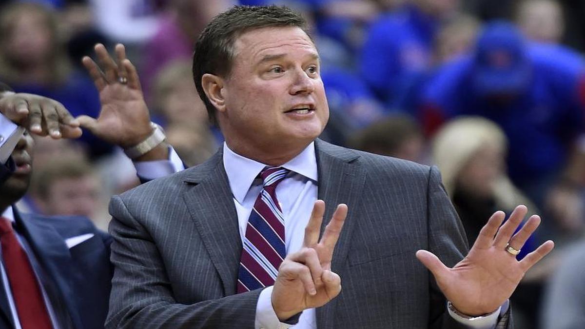 KU coach Bill Self (right) is undefeated in Big 12 Conference openers with the Jayhawks.